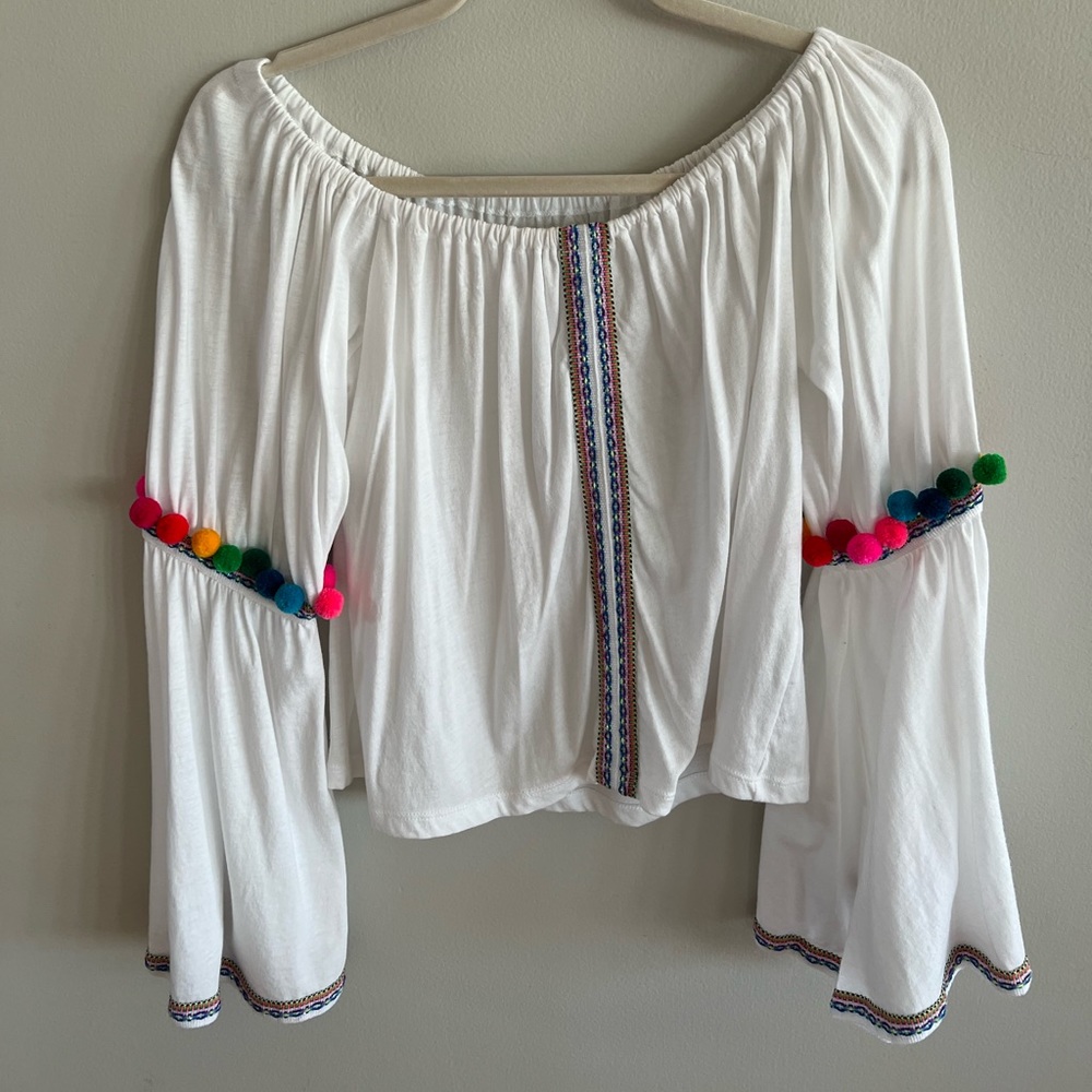 PitUSA White with rainbow detail and pomp pomp top